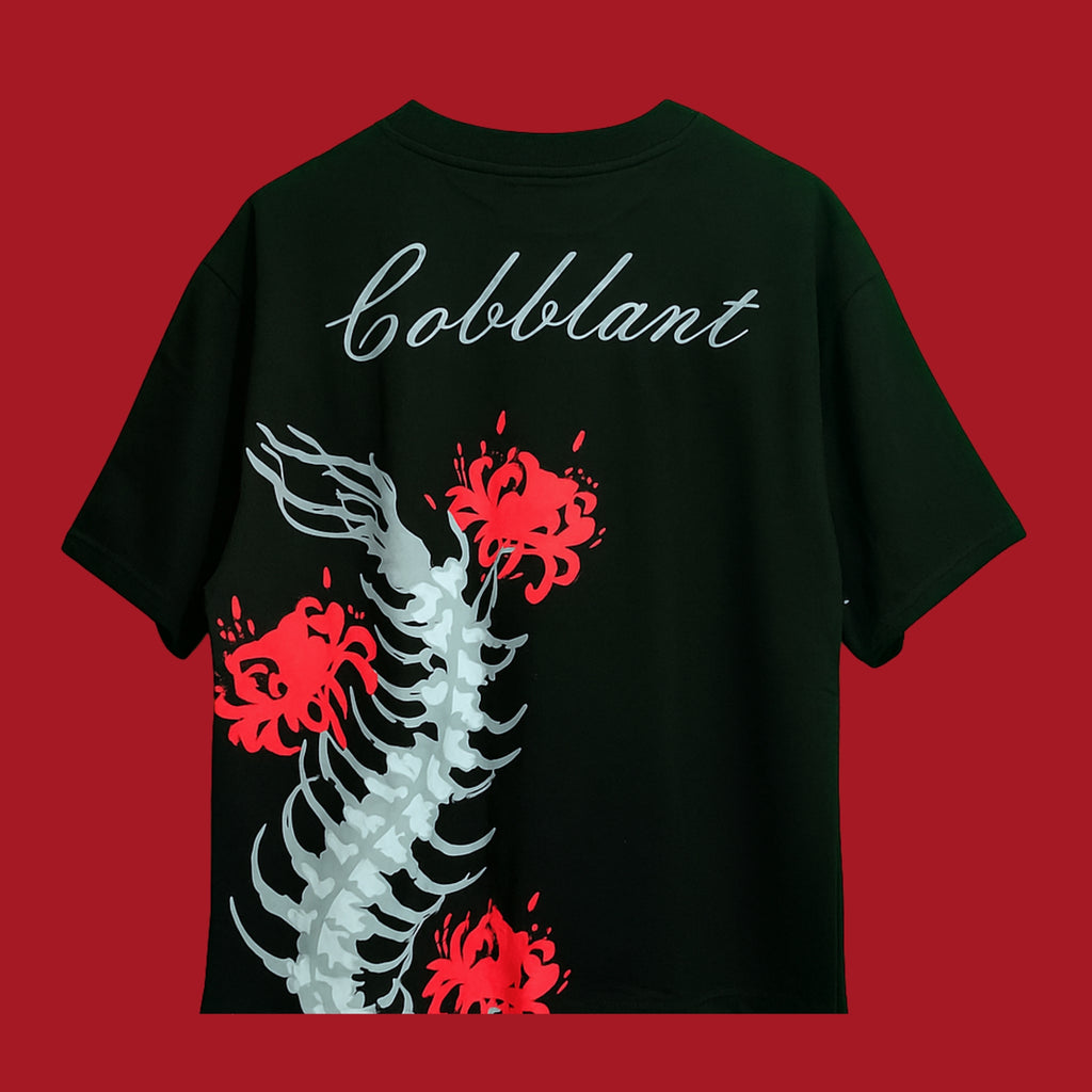 Black t-shirt with a skeleton design and 'Cobblant' text on a red background